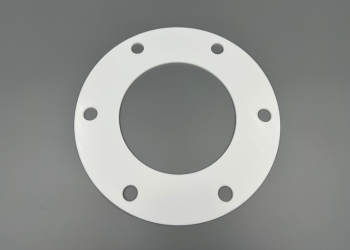 PTFE（テフロン）上水用ガスケットの加工事例｜プレス加工で上水フランジ形状に対応  株式会社ダイコー